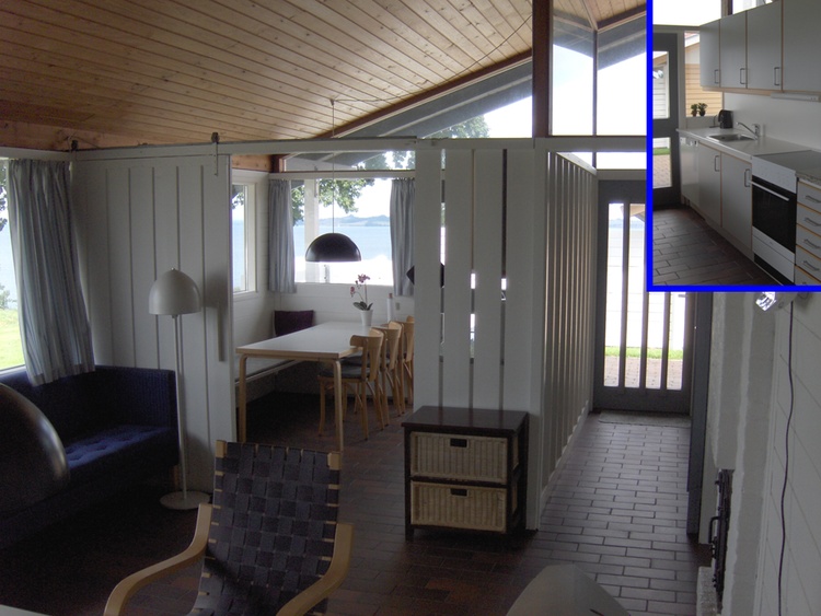 Funktionelle Essküche mit herrlichem Meerblick. Offener Zugang zwischen Wohnzimmer und Küche