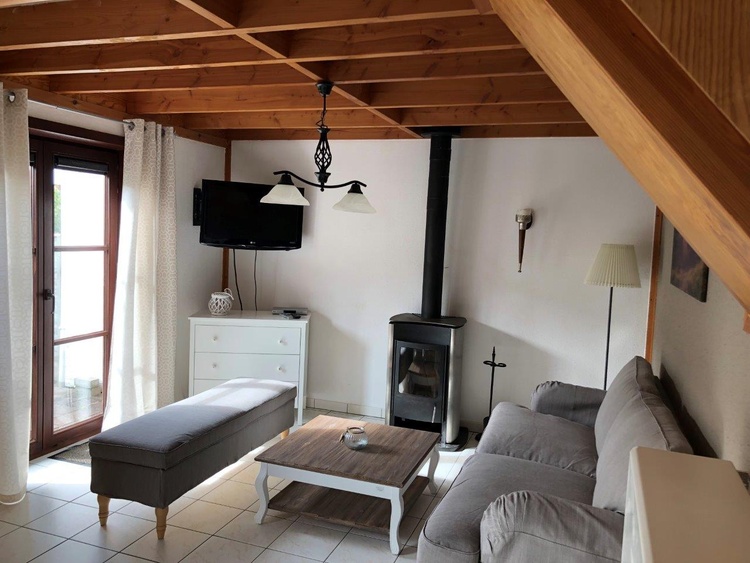 Wohnzimmer mit Specksteinofen