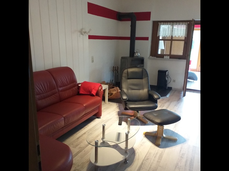 Wohnzimmer mit Blick in den Wintergarten