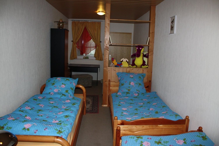 Schlafzimmer mit 3 Einzelbetten