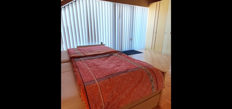 Schlafzimmer mit Balkon