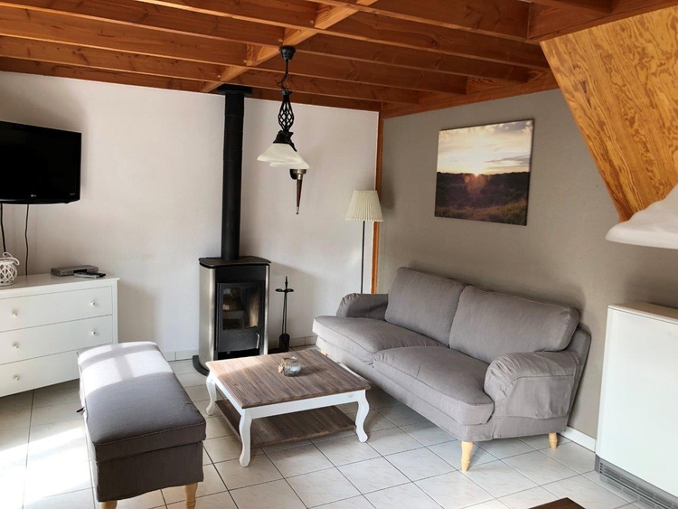 Wohnzimmer mit Kamin