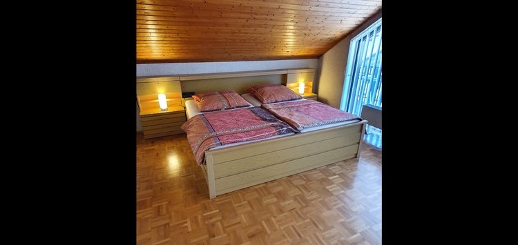 Schlafzimmer mit Balkon