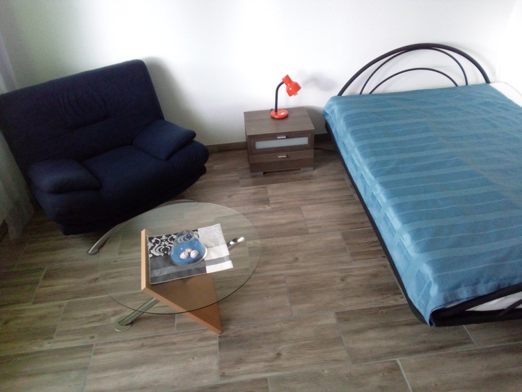 Schlafzimmer mit Doppelbett