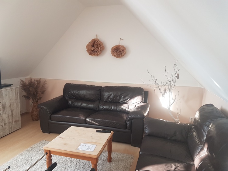 Cocuhecke im Wohnbereich mit bequemer Ledercouch