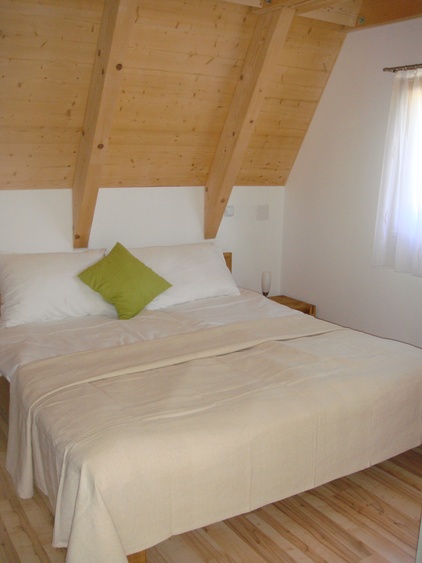 Bett im Obergeschoß