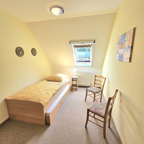 Schlafzimmer mit Rollbett