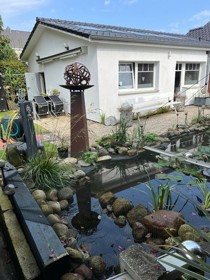 Ferienwohnung mit Teich und Terrasse