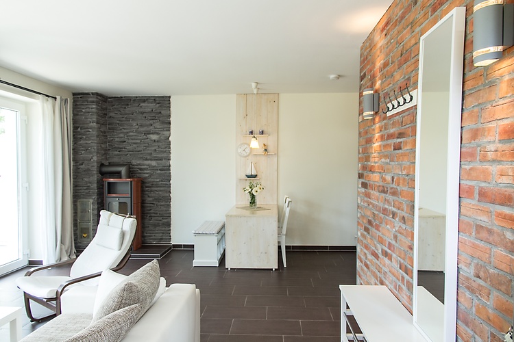 Wohnbereich mit Kamin Ap 1